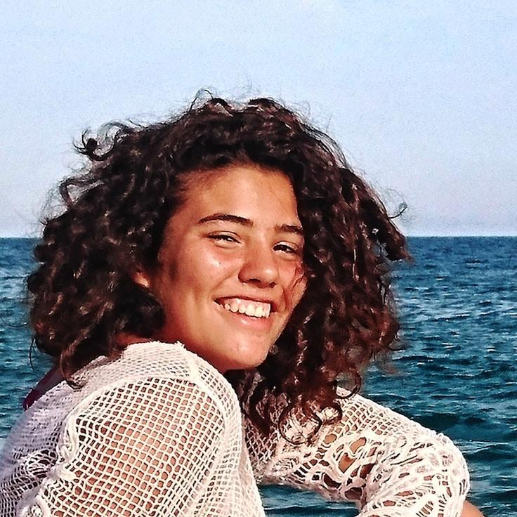 Portrait of Mira Calderon, group coordinator and fusion cooking expert